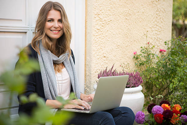 istock Woman in garden. 520022451