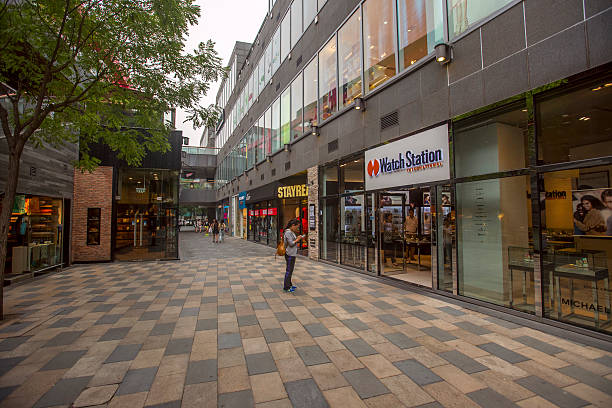 Beijing, China - September 11, 2014: Located in the eastern Chaoyang District, it is a fashion center for shopping, food and arts. It is world-famous for its Bar Street, which is the symbol of Beijng’s nightlife and the city’s first bar community, leading the bar culture and fashion of Beijing. It is divided into northern and southern areas by the ‘3.3 Mansion’.