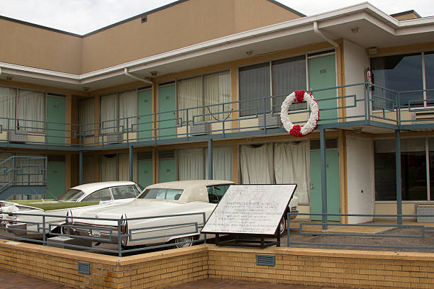 Site of MLK Assassination Memphis, TN, USA - September 15, 2014 :  National Civil Rights Museum located in the old Lorraine Motel, site of the Martin Luther King, Jr assassination, in Memphis TN including the balcony on which he was shot preserved as it was on that date assassination photos stock pictures, royalty-free photos & images