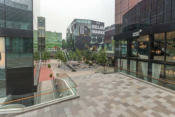 Beijing, China - September 11, 2014: Located in the eastern Chaoyang District, it is a fashion center for shopping, food and arts. It is world-famous for its Bar Street, which is the symbol of Beijng’s nightlife and the city’s first bar community, leading the bar culture and fashion of Beijing. It is divided into northern and southern areas by the ‘3.3 Mansion’.