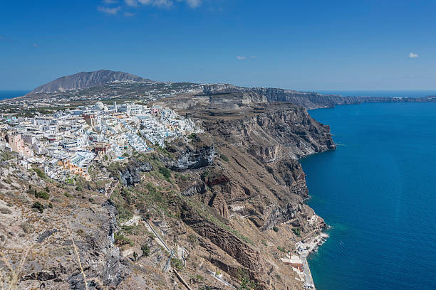 istock Santorini - Thira with ships in the caldera below 520040367