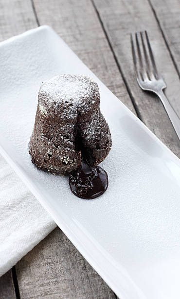 istock souffle on a white dish with wooden background 520040809