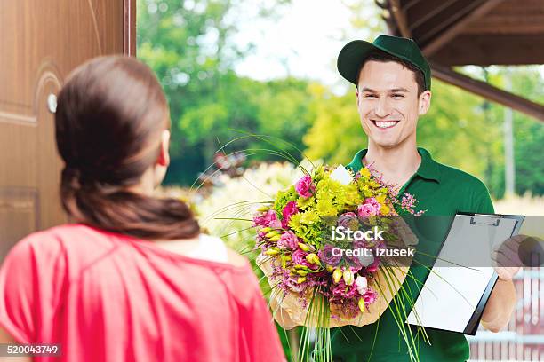 Delivering Flowers Stock Photo - Download Image Now - Delivering, Men, Delivery Person