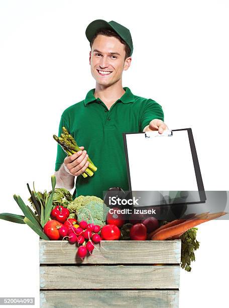 Delivery Man With Organic Food Stock Photo - Download Image Now - Delivering, Food, Men