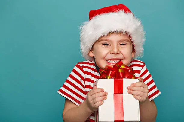 Photo of Kid with Christmas gift