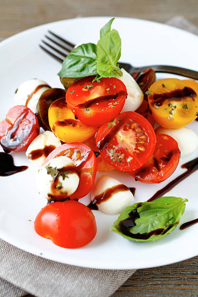 istock caprese salad with wine sauce 520044321