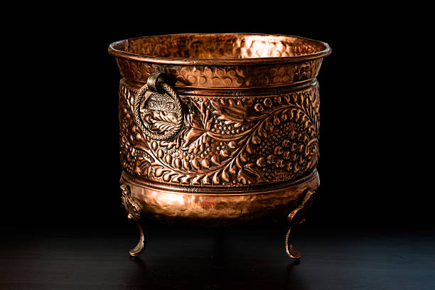 Antique art objects - medieval cauldron stock photo