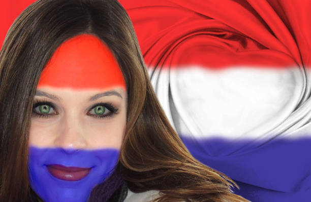 istock Attractive Dutch woman in front of flag 520047082