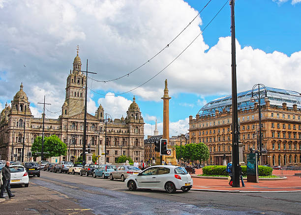 Street view to Glasgow City Chambers Glasgow, Scotland - May 8, 2011: Street view to Glasgow City Chambers in George Square in Glasgow. Glasgow is the city in the Lowlands in Scotland in the United Kingdom. george vi stock pictures, royalty-free photos & images