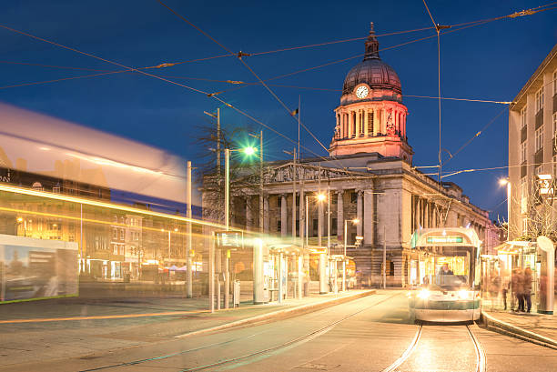 Nottingham Council House with Tram shot at Twilight Nottingham Council House, an old publick local landmark, with Tram shot at Twilight nottingham stock pictures, royalty-free photos & images