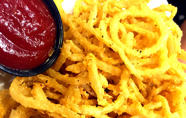 Onion Rings with Sauce stock photo