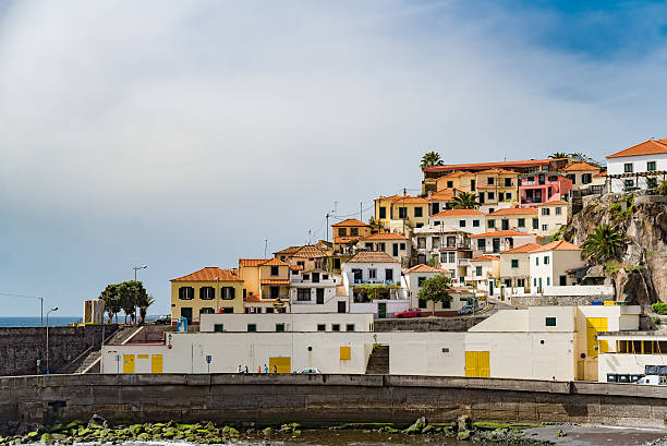 istock Harbor rows of houses on hill 520054754