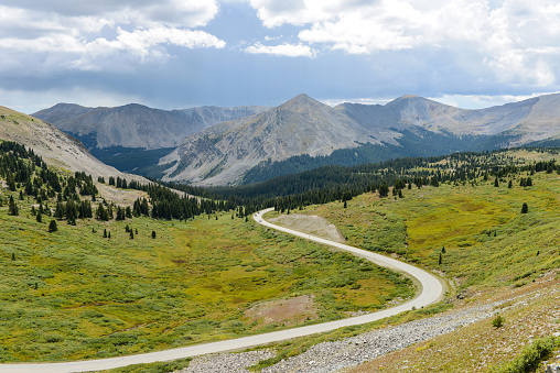 Summer view of scenic Cottonwood Pass near its summit - Continental Divide (12,126 feet). The pass is usually closed from early November to late May each year due to heavy snowfall. 