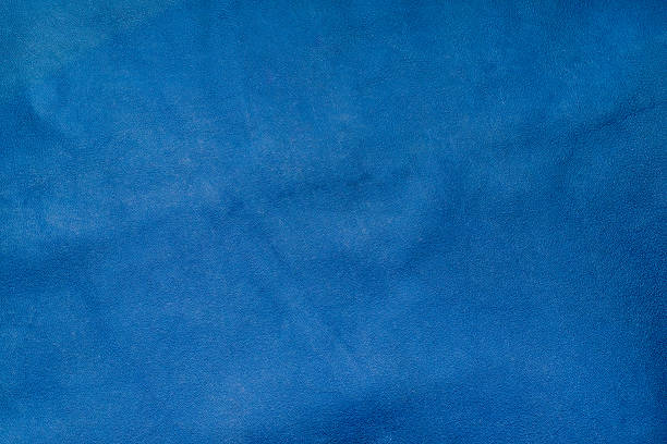 istock Close up blue color crumpled leather texture background 520060672