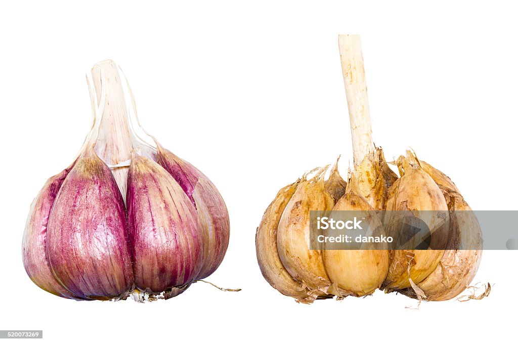 Garlic Two fresh garlics. Isolated on white. Isolated with clipping path. DFF image. Adobe RGB Clipping Path Stock Photo