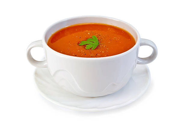 istock Soup tomato in white bowl with parsley 520074335