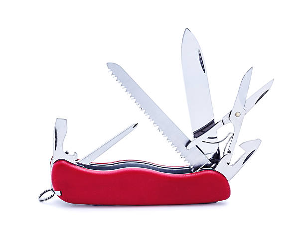 Swiss army knife isolated Swiss army multipurpose multitool knife isolated on white penknife stock pictures, royalty-free photos & images