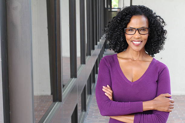 istock beautiful confident woman in purple sweater 520090052
