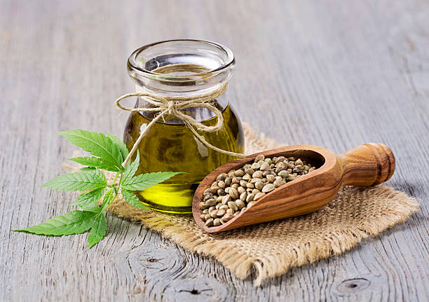 istock Hemp oil n a glass jar 520091380