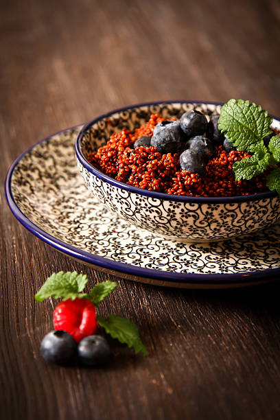 Quinoa blueberries and raspberries on a plate