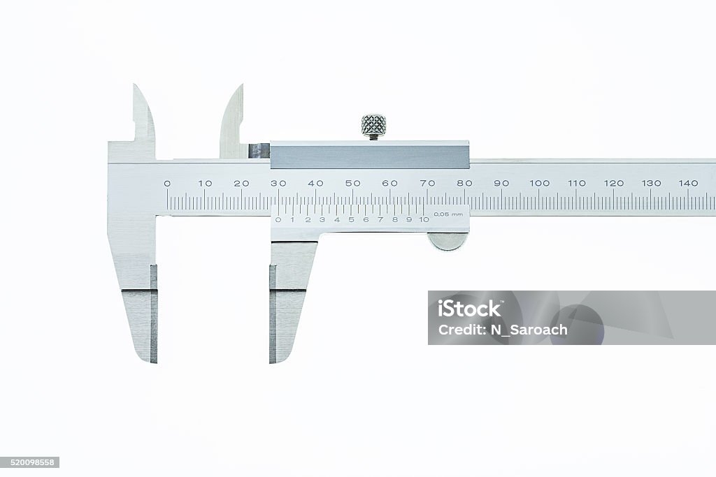 Calibre sobre un fondo blanco - Foto de stock de Calibrador libre de derechos