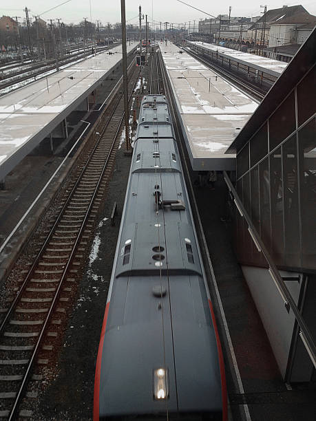 istock railway station and traiin leaving 520099248