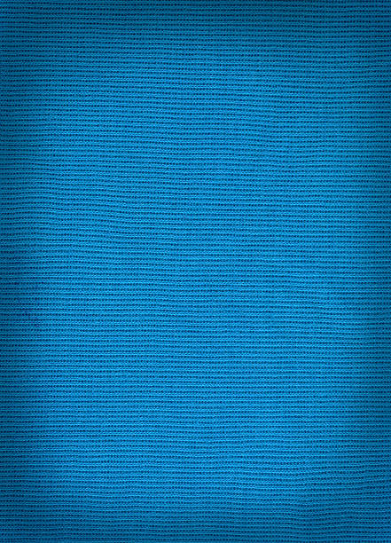 istock knitted woolen fabric blue color for the background. wool  texture. 520100202