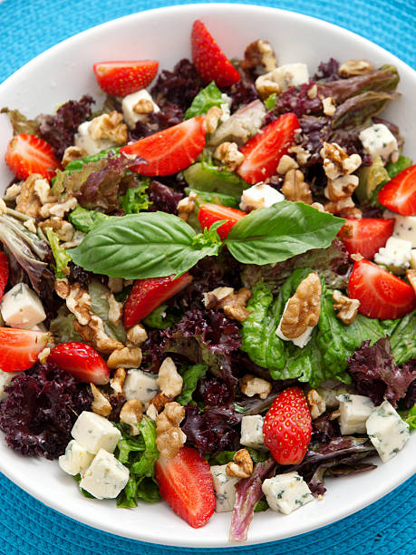 istock Fresh green salad with strawberries and blue cheese 520100276