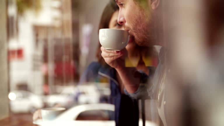 Woman and Man sitting coffee shop in Case