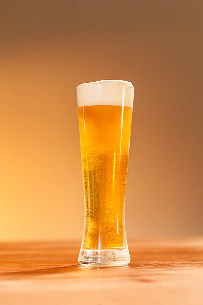 istock Glass of beer standing on the table 520113665