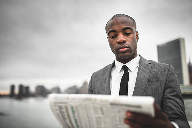 istock Businessman with tablet on the city 520113813