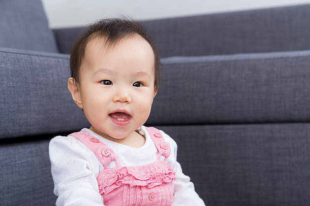 istock Asian baby girl smile 520115095