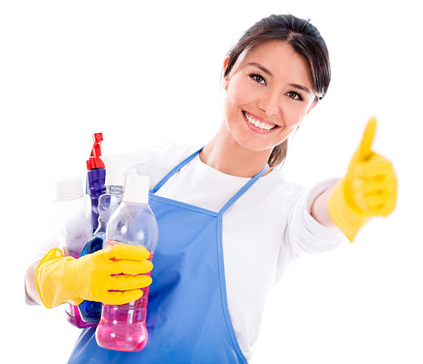 Happy woman with cleaning products