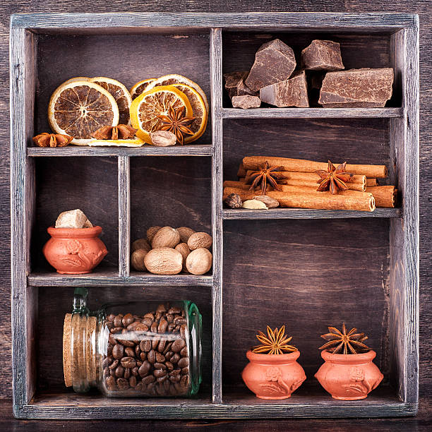 istock Coffee, chocolate and spices in wooden vintage box 520116545
