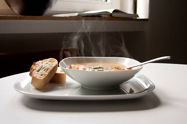 pistou soup with two pieces of bread