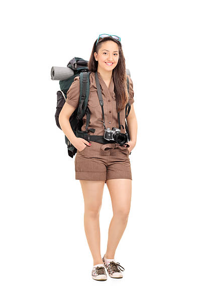 istock Female traveler with hiking equipment 520118897