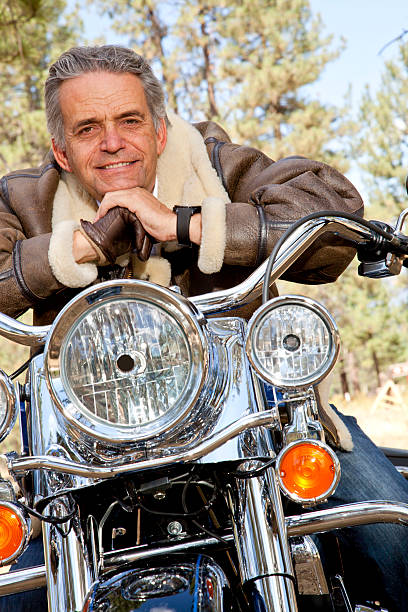 istock Senor couple with Motorcycle 520119729
