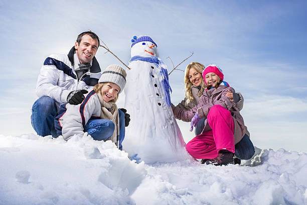 istock Family made a snowman. 520120243