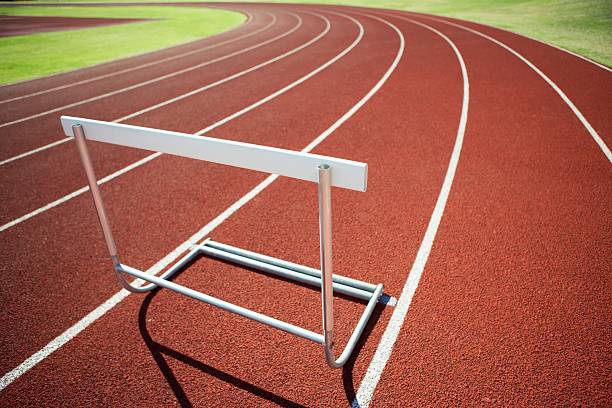 Hurdle on an athletic track Hurdle on an athletic track hurdle stock pictures, royalty-free photos & images