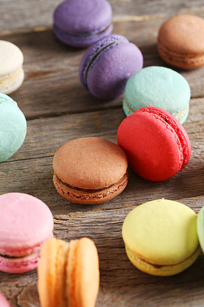 istock French colorful and tasty macarons on grey wooden table 520128712