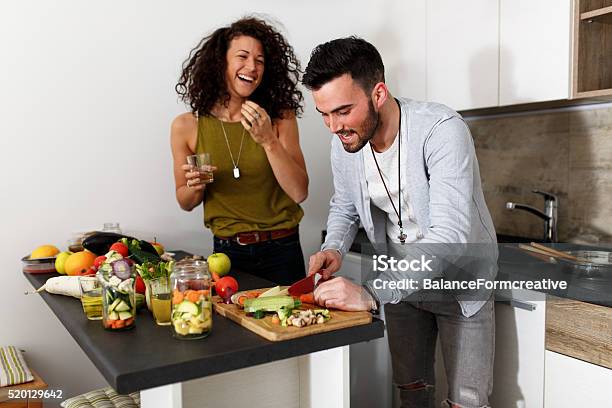 Preparing Food At The Kitchen Stock Photo - Download Image Now - Cooking, Kitchen, Friendship