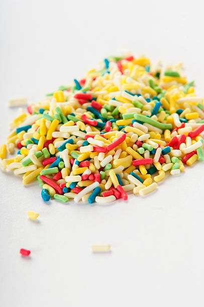 istock Colorful candy sprinkles isolated on white background 520130226
