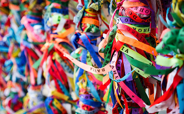 Bonfim ribbons, Salvador, Brazil Bonfim ribbons adorning the front of the Church of Nosso Senhor do Bonfim, Salvador, Brazil.  The bracelets are placed during the Festa do Bonfim to grant wishes to the wearer. sao francisco church bahia state stock pictures, royalty-free photos & images