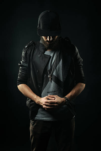 istock The bearded man in jacket stands with his head bowed 520131131