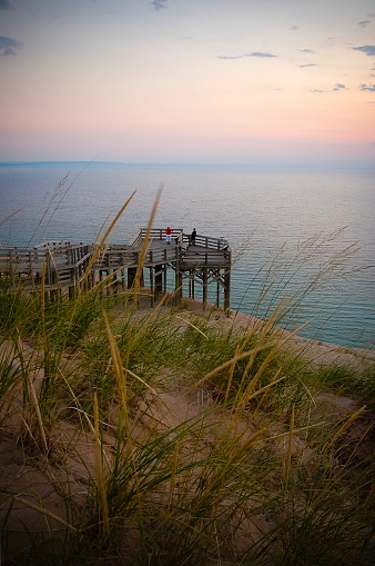 Empire, Michigan, USA - September 4, 2007: People at the Pierce Stocking Lookout at Sleeping Bear Dunes outside of Empire, Michigan at dusk.