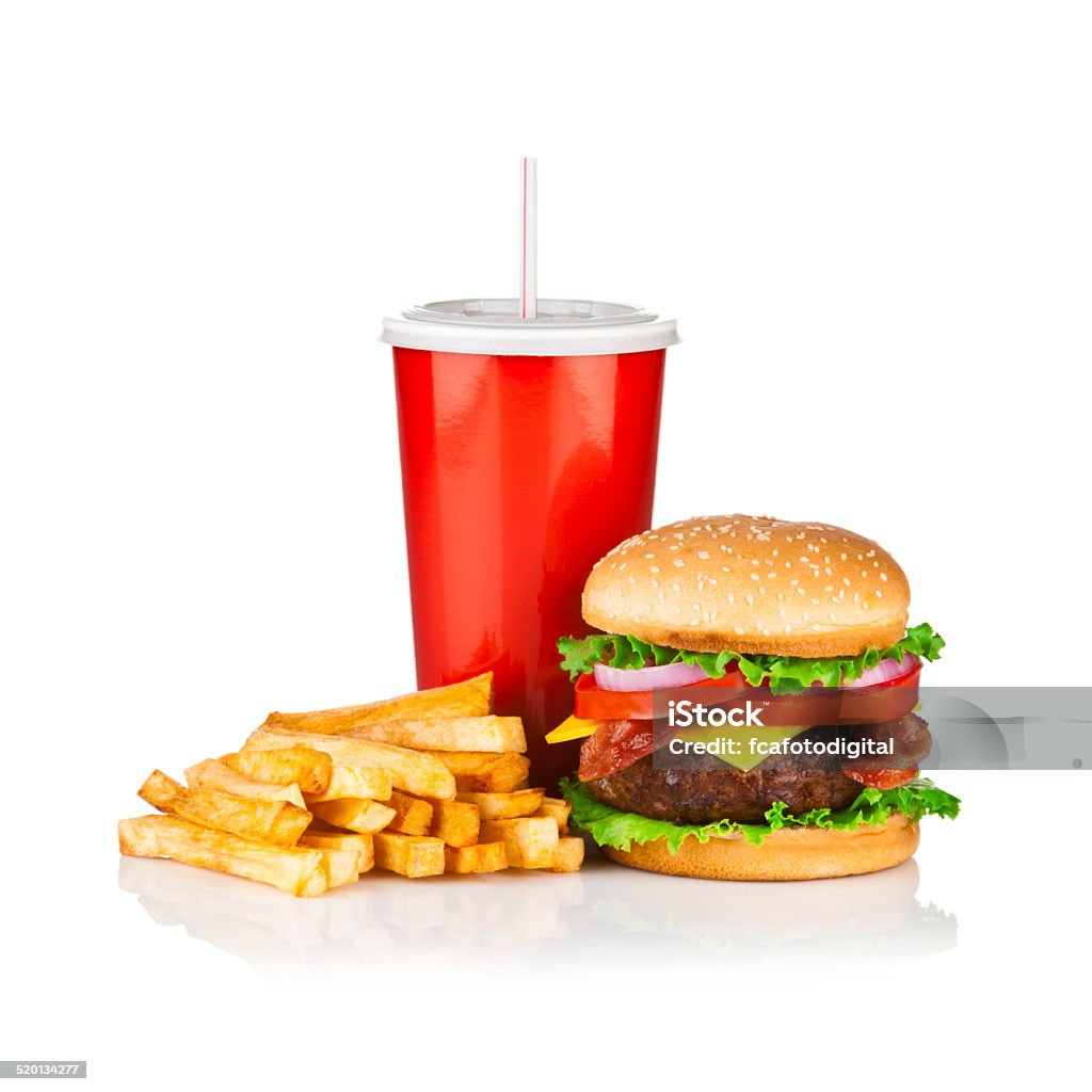 Take Out Food, Classic Cheeseburger Meal isolated on white Cheeseburger, french fries and cola drink isolated on reflective white backdrop, typical combination for this meal. A red disposable cup of cola is in the center, the fries are laying at the left of the cola and a huge cheeseburger is at the right. The ingredients of the burger are a big beef portion, lettuce, bacon, tomato, and bacon on sesame seed bun. Fast Food Stock Photo