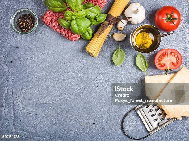 Ingredients For Cooking Pasta Bolognese Spaghetti Parmesan Cheese Tomatoes Metal Stock Photo - Download Image Now