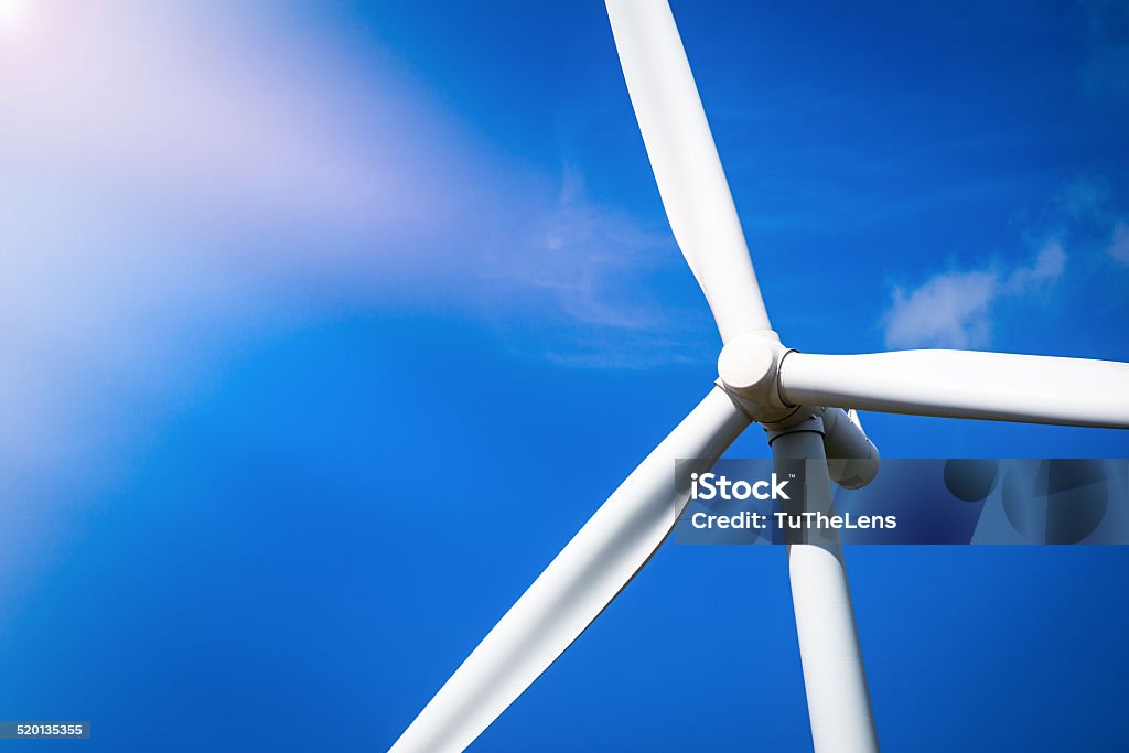 Wind Turbine Farm with Sunlight Climate Stock Photo