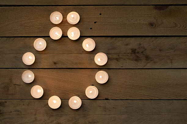 istock Christmas Tea Lights,  Wooden Background - Bauble 520135421