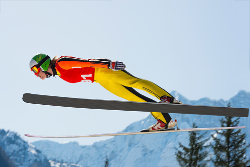 The Muehlenkopf ski jump in Willingen, Germany. The stands are deserted, it's snowing and it's optimal conditions for ski jumping.